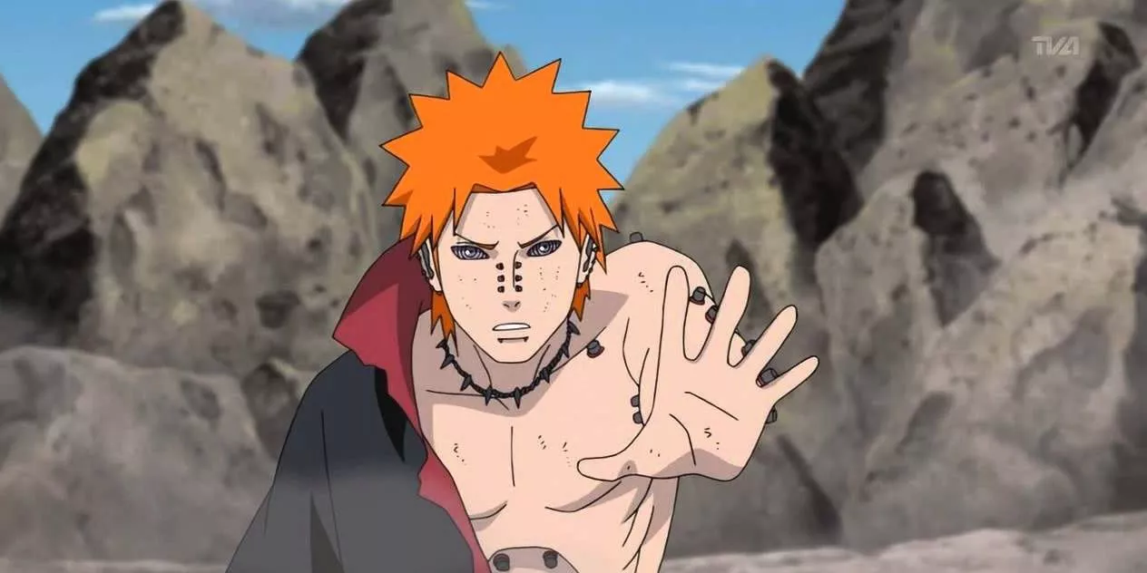 Pain levantando su mano hacia algo en las ruinas de Konoha en Naruto Shippuden.