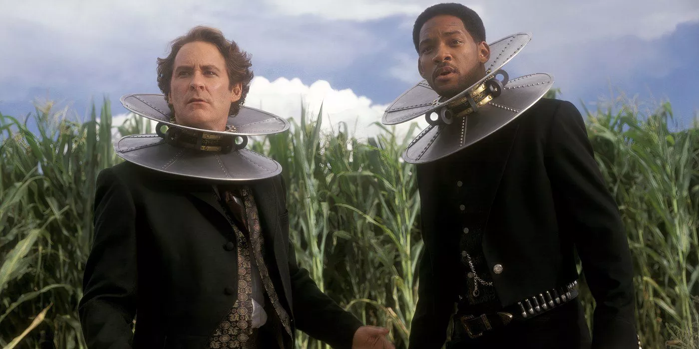 Will Smith as James West and Kevin Kline as Artemus Gordon regrouping after a gunfight in Wild Wild West.