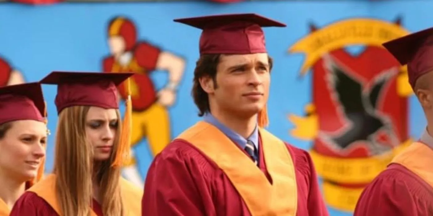 Clark stands in a cap and gown during graduation in Smallville.