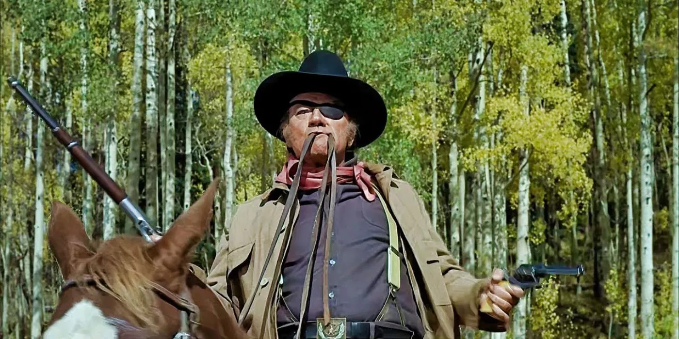 Rooster Cogburn readies for battle with the reins in his mouth in True Grit.