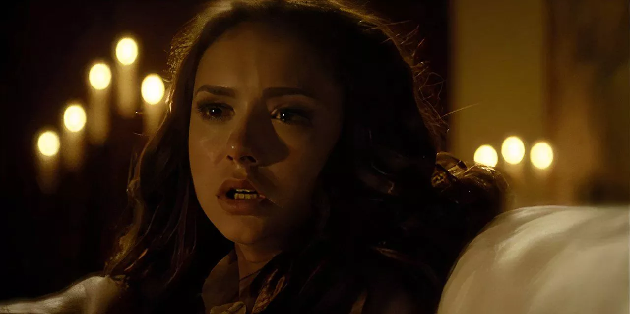 Katherine cries as her daughter is taken from her in The Vampire Diaries