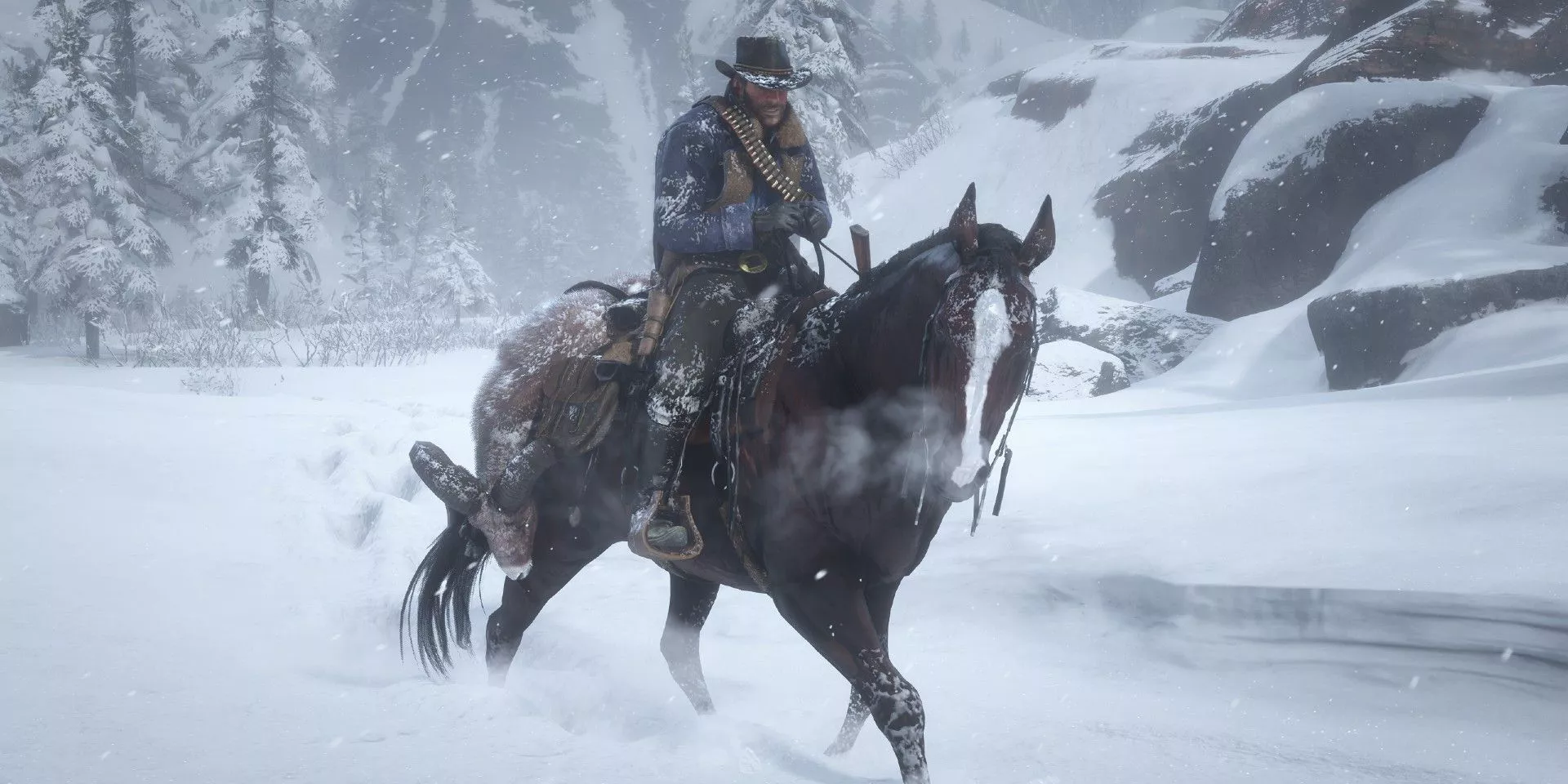 Arthur riding through the snow on a horse in Red Dead Redemption 2