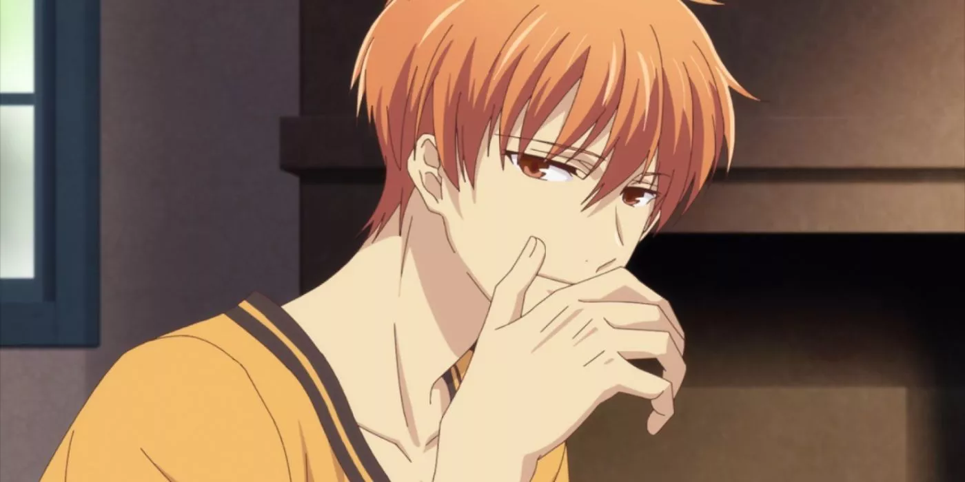 Kyo Sohma smiling while covering his face in Fruits Basket.