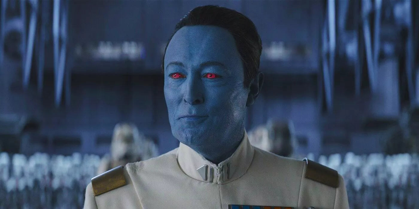 Grand Admiral Thrawn (Lars Mikkelsen) smiles smugly while marching through The Chimaera.