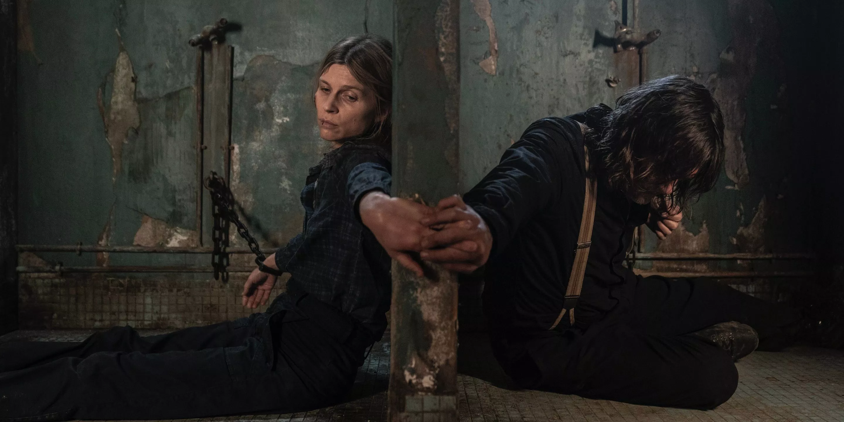 Isabelle Carriere and Daryl Dixon holding hands on The Walking Dead: Daryl Dixon