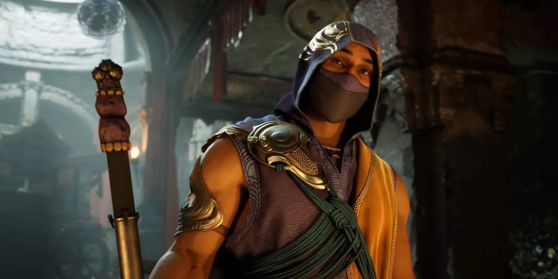 Rain hablando mientras usa una máscara y sostiene su bastón de agua en Mortal Kombat 1