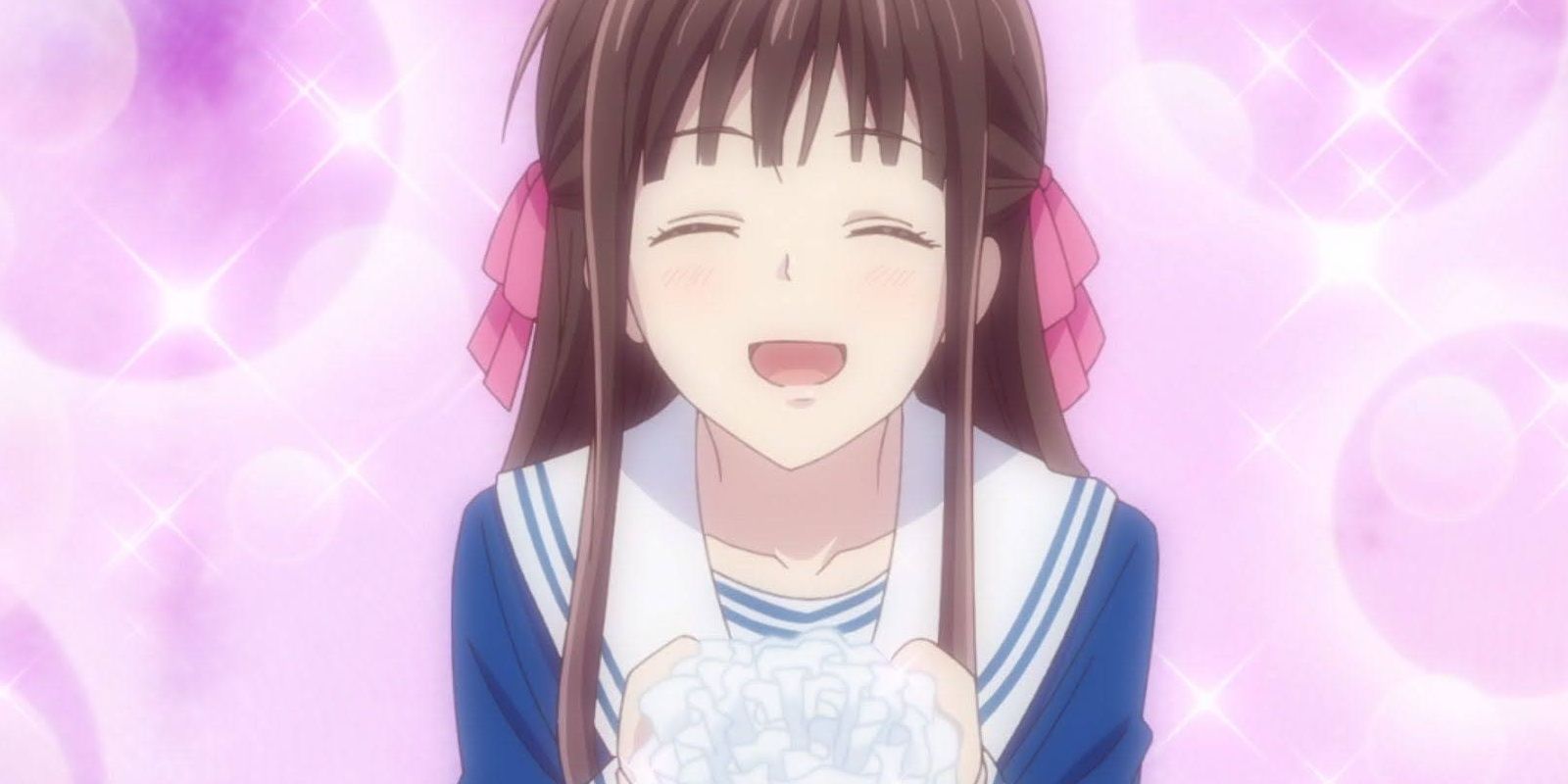 Tohru Honda looks happy with a pink background in Fruits Basket.