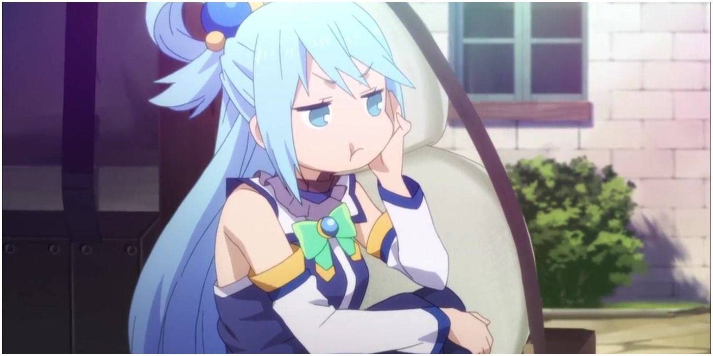 Aqua pouts while sitting on a carriage.