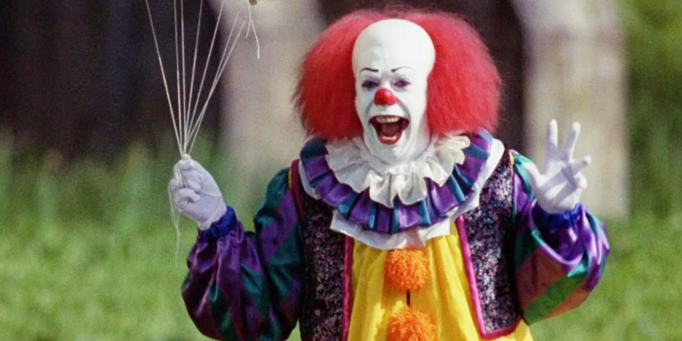 Tim Curry as Pennywise the Clown taunting Ben in IT (1990)