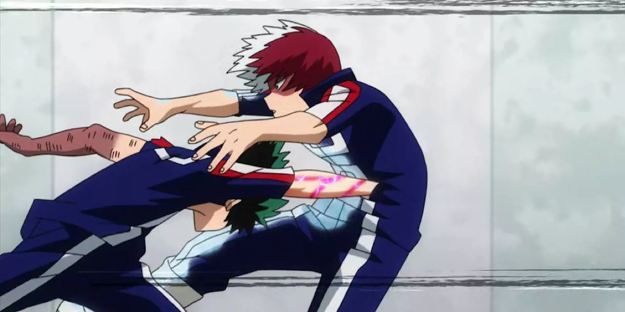 Deku punching Todoroki in their match.