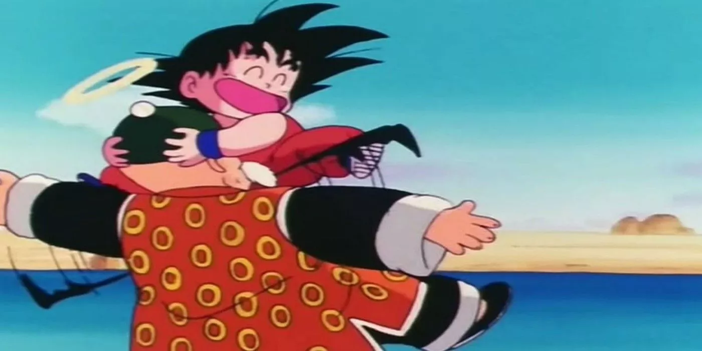 Goku embraces the ghost of Grandpa Gohan in Dragon Ball.