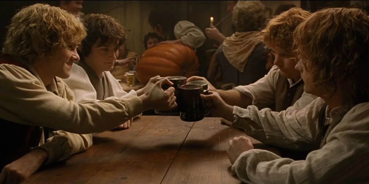 Frodo, Sam, Pippin y Merry celebran su regreso a la Comarca en El Retorno del Rey.