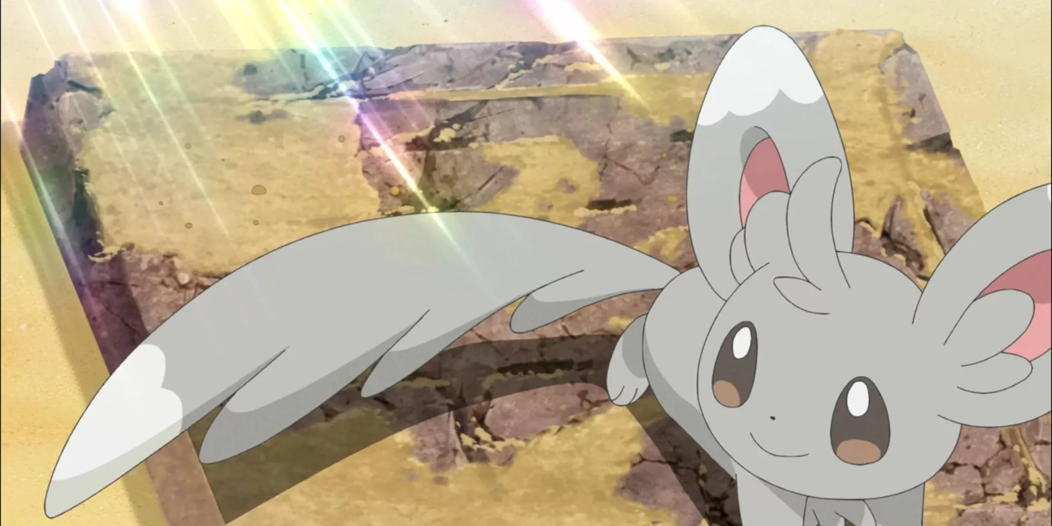 Minccino using its tail to dust off an old stone slab in Pokemon