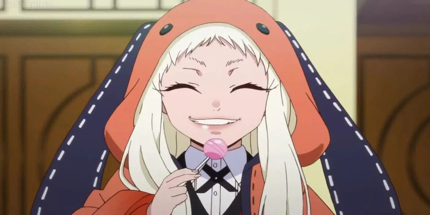 Runa Yomozuki grins with a pink lollipop as she wears an orange coat.